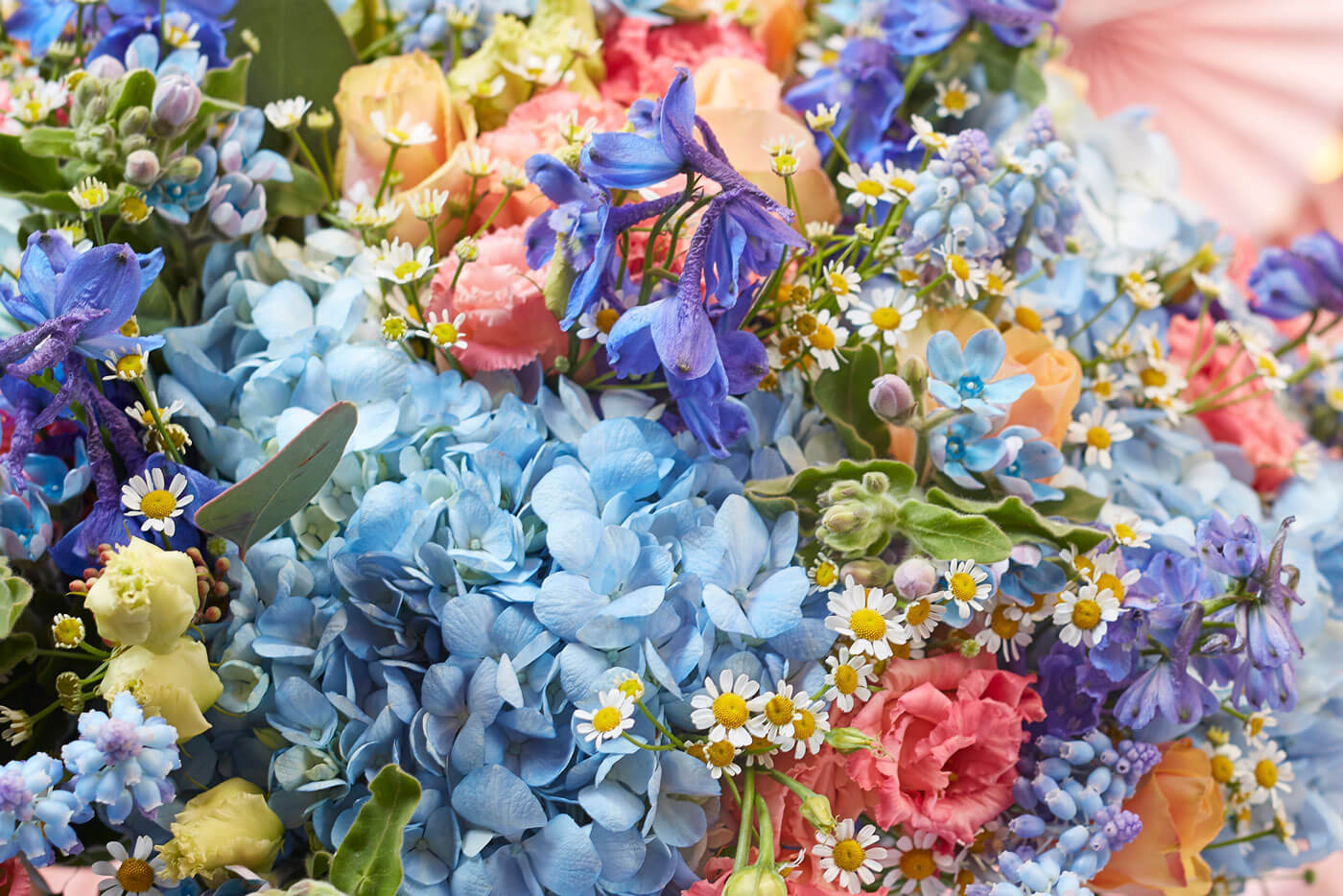 A beautiful display of flowers in pastel colours